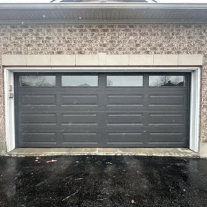 Modern Black Garage Door with Window Inserts