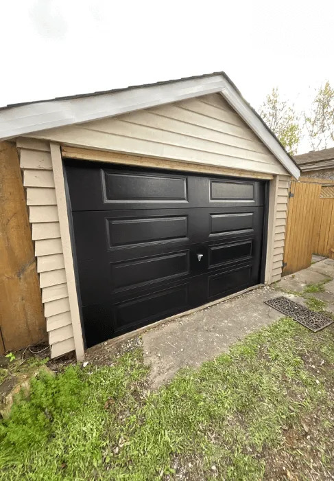 homeowner getting same day garage door repair in kanata