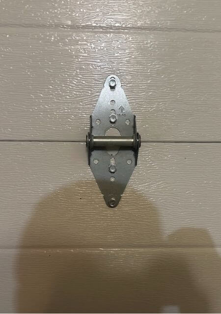 garage door brackets and hinges replacement services in ottawa