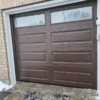 brown modern single garage door with windows