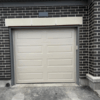cream modern single garage door