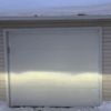 white modern single garage door