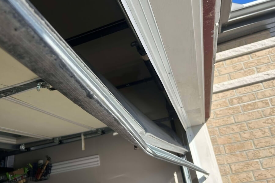 garage door weather strip winter damage