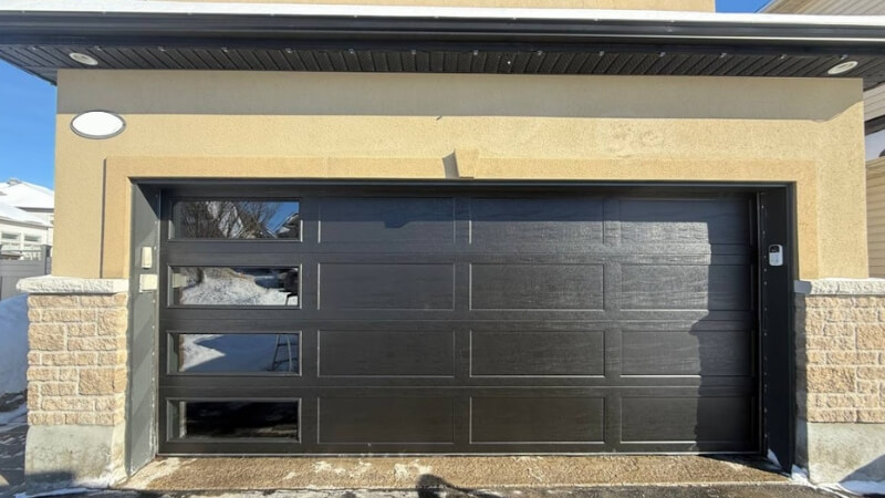 professional technicians fixing garage doors in ottawa
