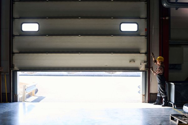 young-female-worker-of-factory-or-hangar-opening-s-2022-05-19-16-48-17-utc (1)